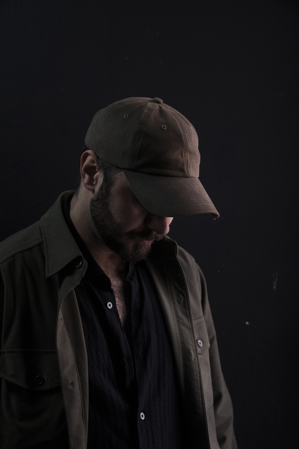 Akhilles Kiyani portrait — cap
